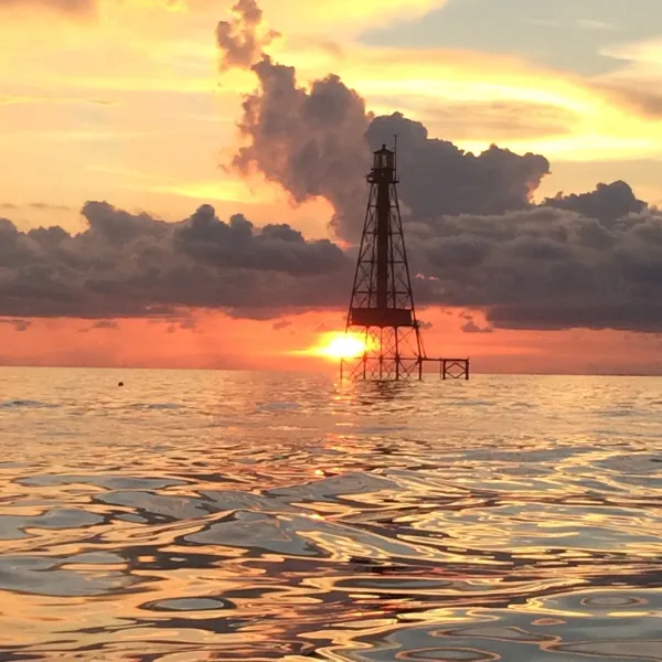 a sunset over a body of water