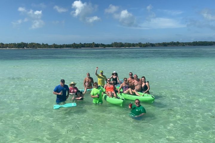 a group of people swimming in a body of water