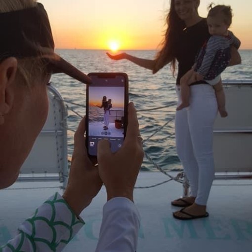 a woman looking at her cell phone