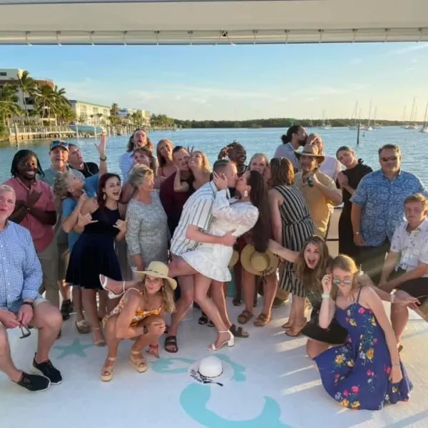 a group of people sitting posing for the camera