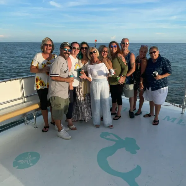 a group of people on a beach