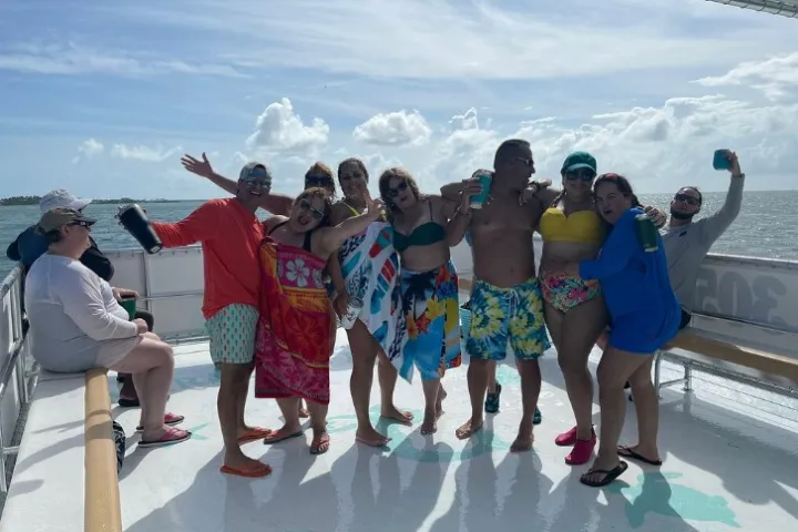 a group of people on a beach
