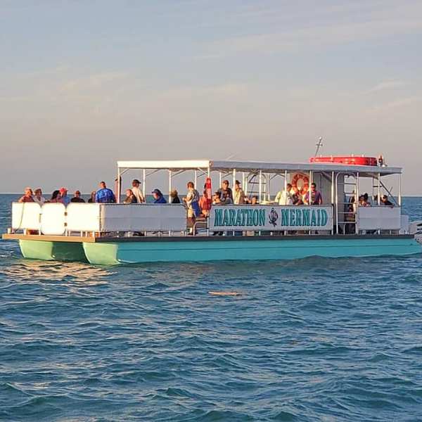 a small boat in a large body of water